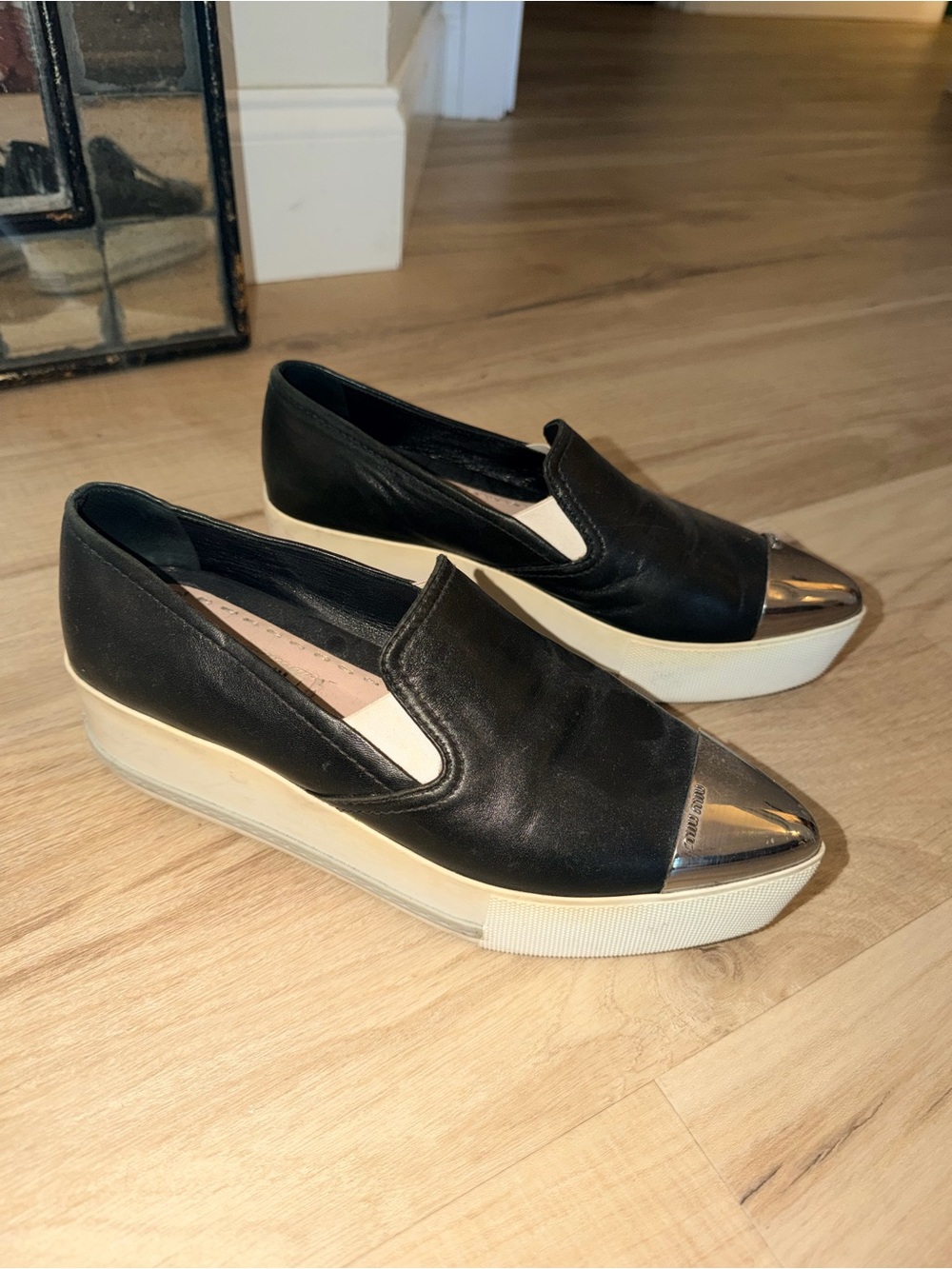Miu Miu Black Slip-On Platform Mules with Metallic Toe Cap
